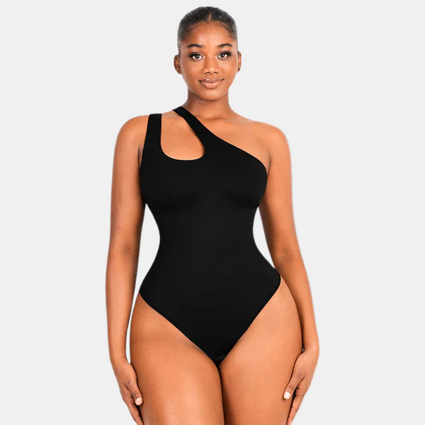 Woman wearing a black one-shoulder swimsuit on a plain background