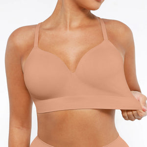 Beige sports bra worn by a person on a white background