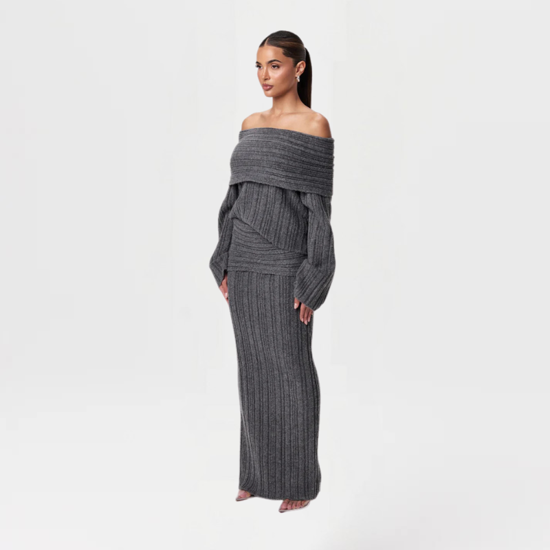 Elevate your autumn and winter wardrobe with this stylish two-piece ensemble that effortlessly blends comfort and elegance. The high-waisted maxi skirt features a mo