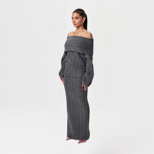Elevate your autumn and winter wardrobe with this stylish two-piece ensemble that effortlessly blends comfort and elegance. The high-waisted maxi skirt features a mo