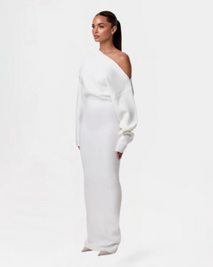 Our cozy knit sweater dress brings all the cool-weather-feels with an off-shoulder design, long loose sleeves, and an oversized sweater-look at the bust. Allow it to