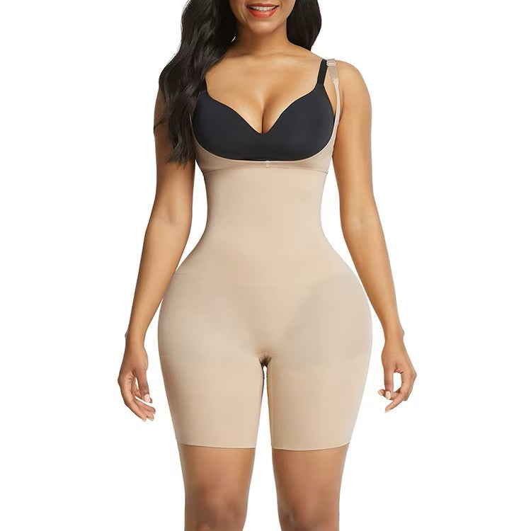 Woman wearing a brown shapewear bodysuit on a white background