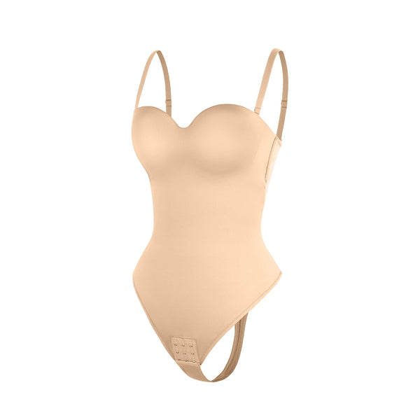 Beige swimsuit with thin straps on a white background