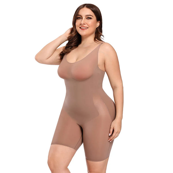 Woman wearing a beige bodysuit on a white background