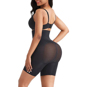 Black bodysuit with sheer panels worn by a model on a white background