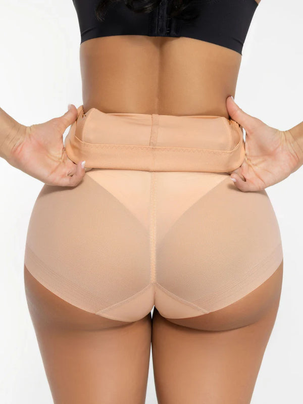 Beige shapewear being worn by a person on a white background