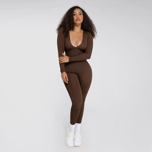 Woman wearing a brown outfit on a white background